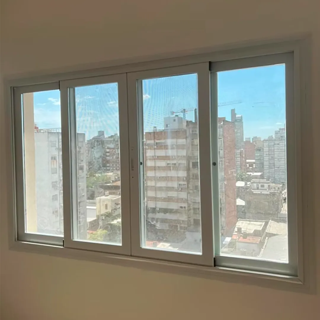 Ventana corrediza panorámica de cuatro paños